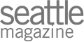 The image shows the logo of "Seattle Magazine" in gray, displaying the magazine's name in a simple and bold font.