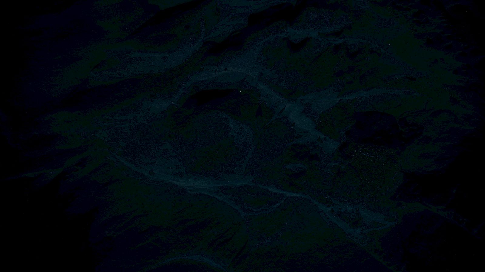 The image appears very dark and unclear, making it difficult to identify any specific objects or scenes clearly.